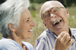 Foto: spain, mallorca, senior couple, woman tickling man with blade of grass, laughing, portrait, close-up spain, mallorca, senior couple, woman tickling man with blade of grass, laughing, portrait, close-up