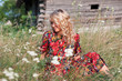 Beautiful blond woman in the village