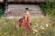 Beautiful blond young woman in the village