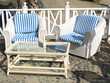 Photo: Two cane armchairs and a table Two cane armchairs and a table