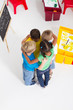 children huddle