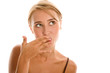 Woman licking fingers Woman licking fingers