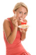 Happy woman eating cake Happy woman eating cake