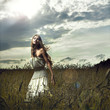 Woman in wheat field