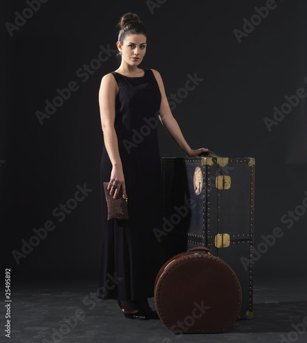 Photo: One elegant woman in retro style _ Traveling One elegant woman in retro style _ Traveling