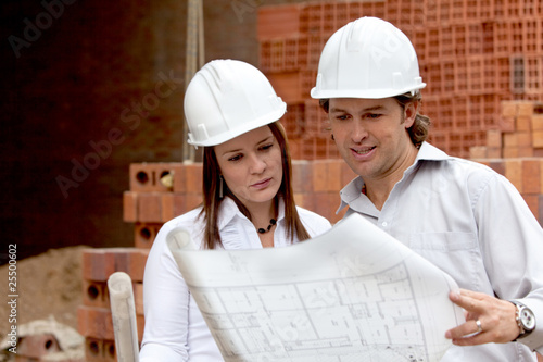 Photo: Architects at a construction site Architects at a construction site