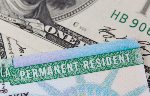 Photo: USA Permanent Resident card aka Green Card and paper money