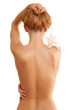 back of nude beautiful girl with flower