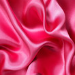 Smooth elegant red silk as background Smooth elegant red silk as background