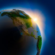 Sunrise over the Earth in outer space