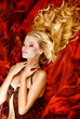 Portrait of beautitful nude young woman in red bed Portrait of beautitful nude young woman in red bed