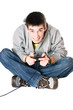 Young man with a joystick for game console