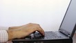 Man open and Typing on Laptop