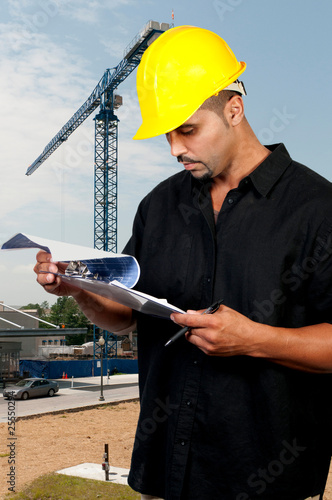 Photo: Construction Worker with Clipboard Construction Worker with Clipboard