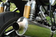Motorrad Hinterrad mit Auspuff und Federbein