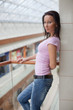 Girl is relaxing on a balcony