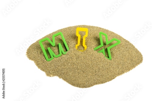 Photo: mix word written on sand with colored letters mix word written on sand with colored letters