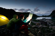 couple camping at night