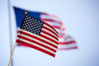 American toy flag over other big flag.