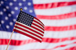 American toy flag over other big flag.