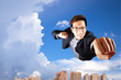 businessman fly in sky over the city
