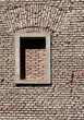 old brick wall with built-in window old brick wall with built-in window