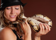woman holding a snake woman holding a snake