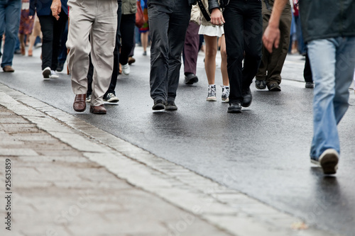 Photo: Crowd walking - group of people walking together (motion blur) Crowd walking - group of people walking together (motion blur)
