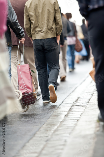 Photo: Crowd walking - group of people walking together (motion blur) Crowd walking - group of people walking together (motion blur)
