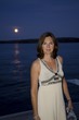 Woman On Dock At Night, Lake Of The Woods, Ontario, Canada