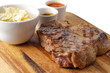 meat and sause on a cutting board meat and sause on a cutting board