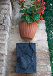 Flowerpot and postbox.