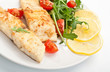 white fish with vegetables and lemon