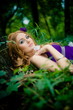 redhaired girl in wood