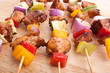 colourful beef, chicken and pork kebabs