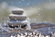 sprinkles on the white stones in the water