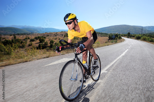 Photo: Cyclist riding a bike Cyclist riding a bike