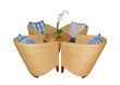 Four wicker chairs surrounding a small round table, Isolated on