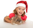Child in the New Year hat with a rabbit.