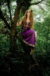 red-haired girl in wood