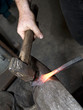 hands of smithy by the work