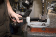 hans of smith by the work on the drill