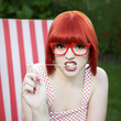 Girl playing with chewing gum