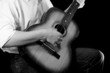 Foto: guitar at black background guitar at black background