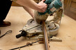 Carpenter making kitchen furniture,