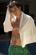 Portrait of a young man on swimming pool