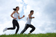 Young couple exercising in park
