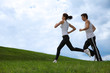 Young couple exercising in park