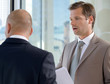 Close-up of businessmen conversing