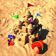 sand castle with beach toys